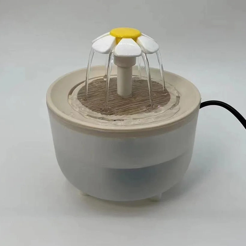 Paw Care USA automatic pet water fountain with flower design and flowing water streams