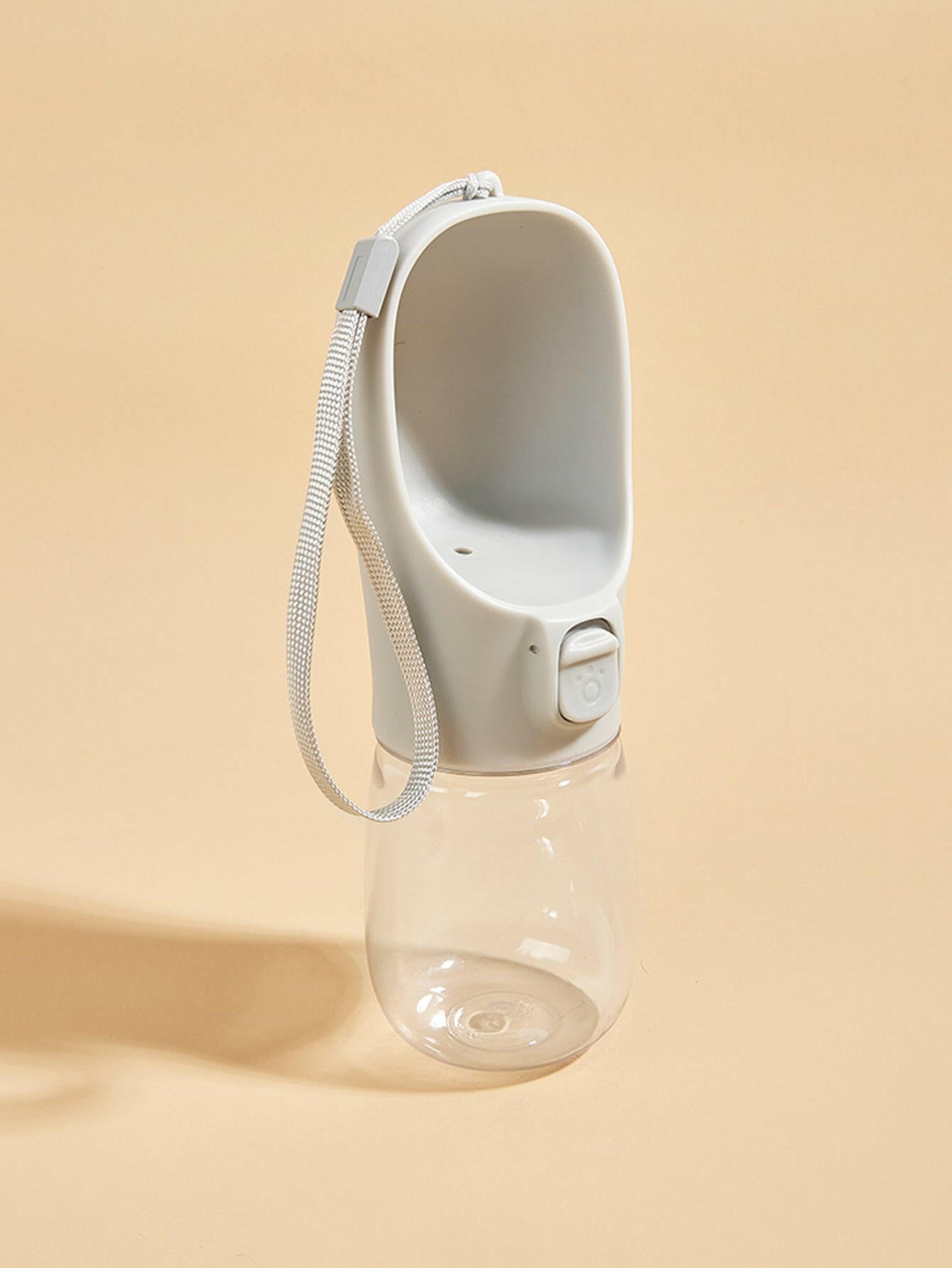 Paw Care USA dog and cat travel water dispenser with gray top and clear water bottle for pets