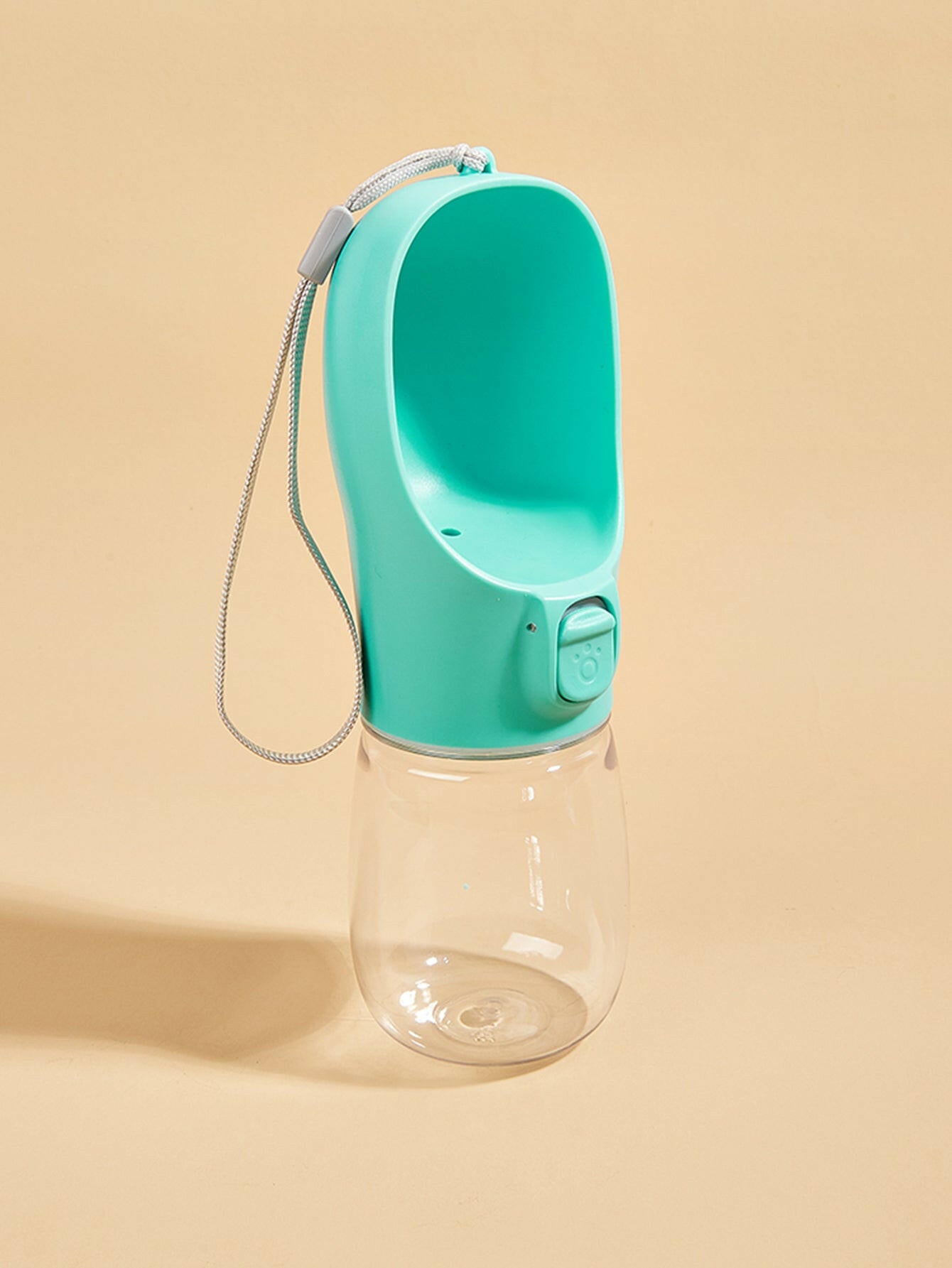 Paw Care USA dog and cat travel water dispenser in teal with attached bottle and carrying strap