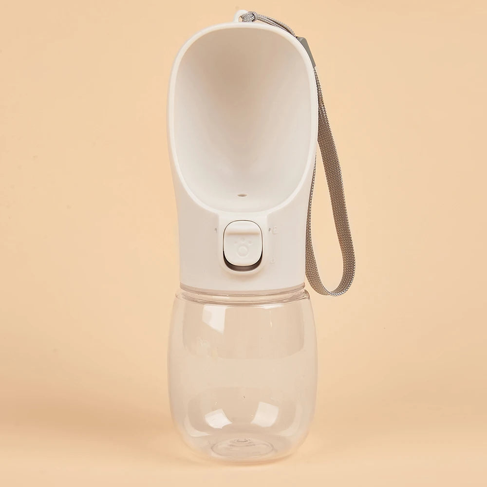 Paw Care USA dog and cat travel water dispenser in white with attached carrying strap for pets on the go