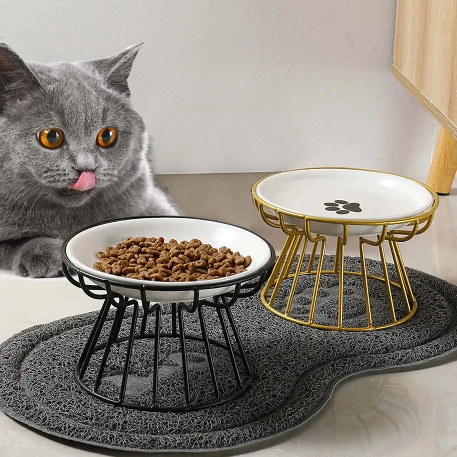 Elevated cat & Small Dogs feeder for healthy digestion with black and gold stands and white bowls on gray mat