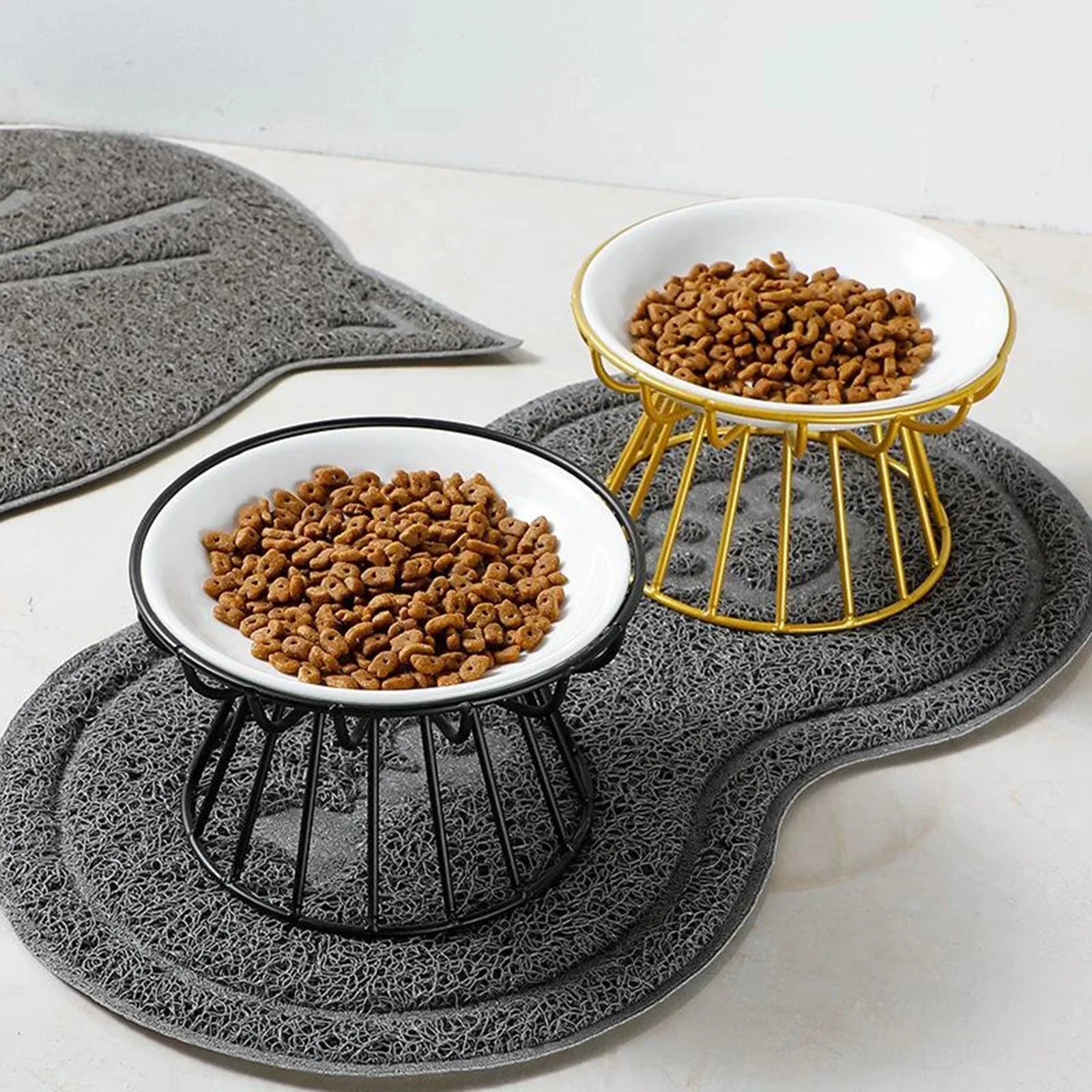Elevated cat & Small Dogs feeder for healthy digestion with gold and black metal stands and white bowls filled with dry pet food