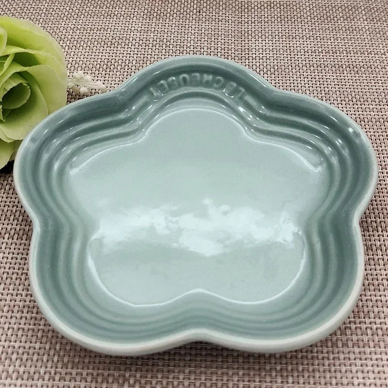 Paw Care USA whisker friendly cat bowl in light blue with a paw-shaped design