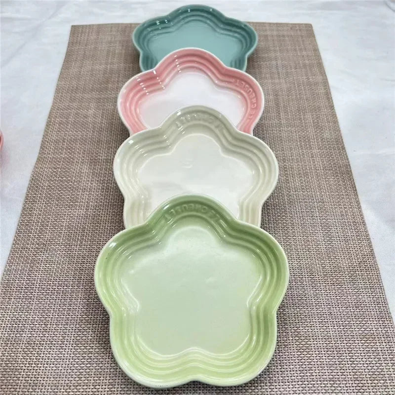 Paw Care USA colorful whisker friendly cat bowl set in pastel green, white, pink, and teal flower shapes