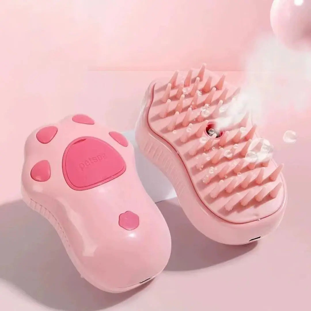 Pink pet hair removal brush massager for Cats & Dogs with soft silicone bristles and ergonomic grip