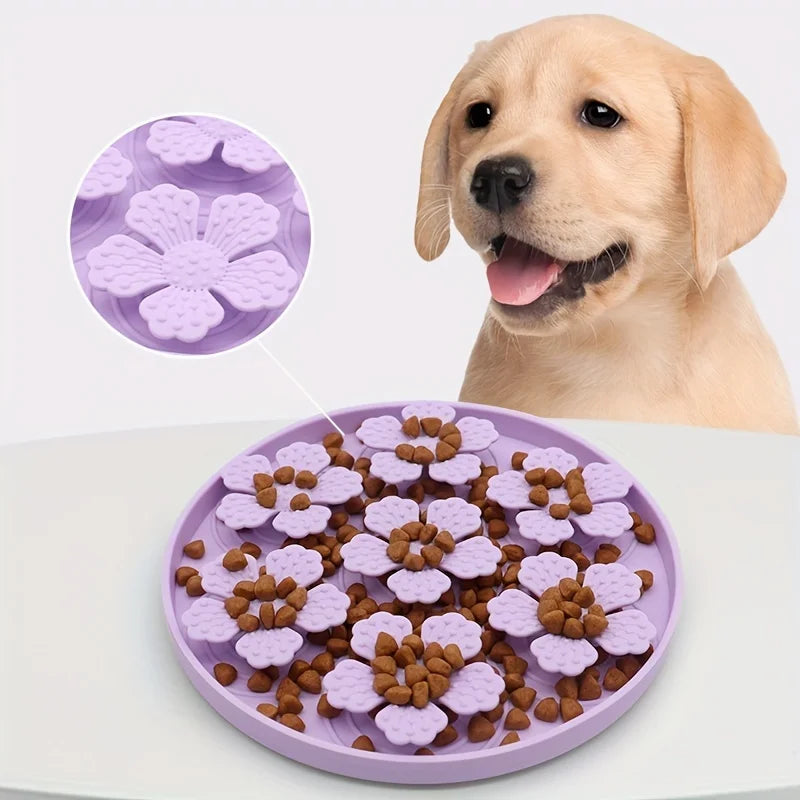 Purple pet slow feeding bowl for dogs with flower puzzle design and dog kibble inside