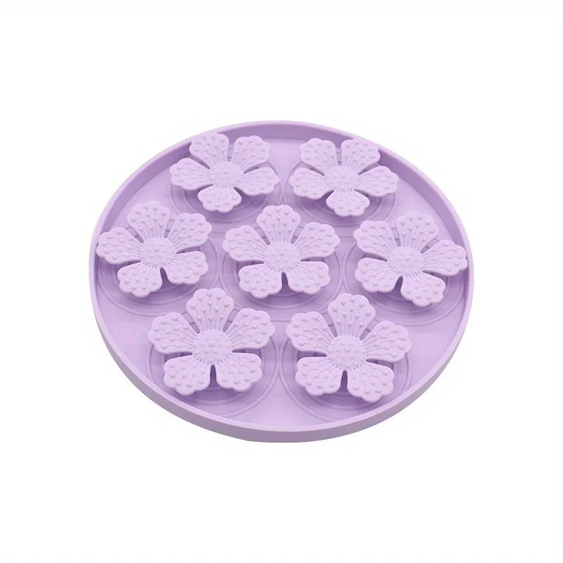 Purple pet slow feeding bowl for dogs with flower-shaped raised sections to promote slower eating
