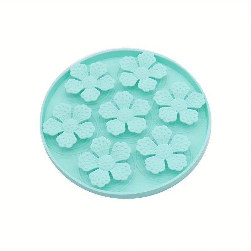 Paw Care USA pet slow feeding bowl for dogs in teal with raised flower-shaped obstacles