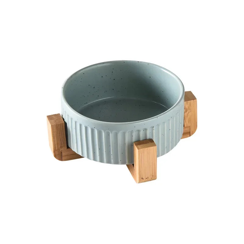 Premium ceramic pet food and water bowls with modern ribbed design and wooden stand by Paw Care USA